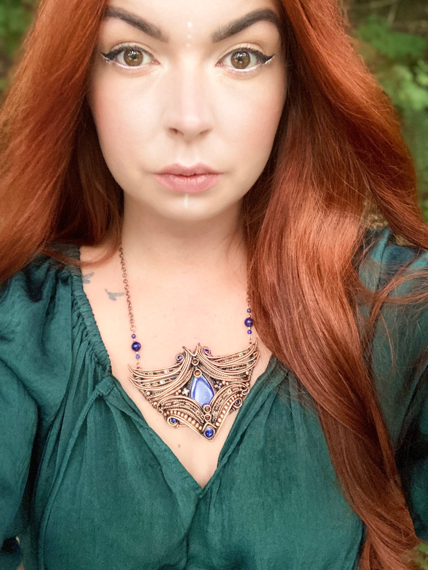 Aptera Siren Wing amulet